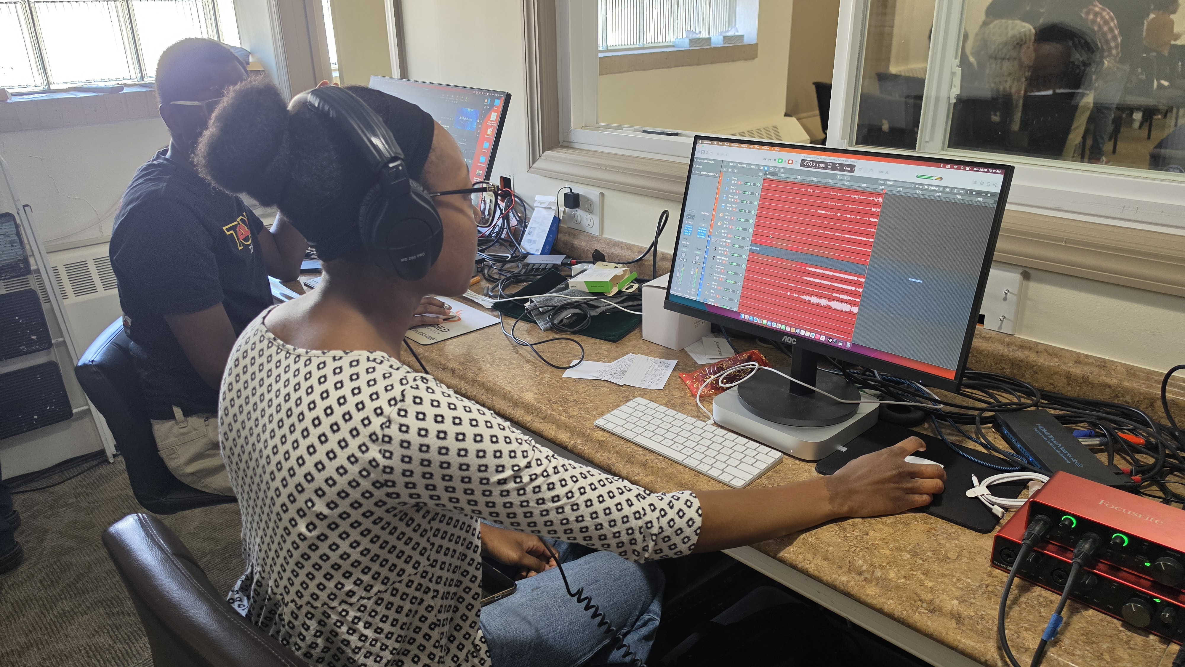 Student recording at workstation